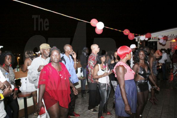 Anthony Minott/Freelance Photographer
A section of the crowd during Ken's Wildflower Valentine's Night party atop the roof of Ken's Wildflower Restaurant and Lounge, Port Henderson Road, Portmore Plaza, Tuesday, February 14, 2012.