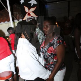 Anthony Minott/Freelance Photographer
A couple on the dance floor during Ken's Wildflower Valentine's Night party atop the roof of Ken's Wildflower Restaurant and Lounge, Port Henderson Road, Portmore Plaza, Tuesday, February 14, 2012.