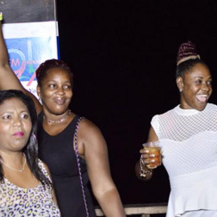 Anthiny MinttFreelance PhotographerA group of ladies enjoy themselves at Krazy Kris' birtday party at Jewels' Port Henderson Road, Portmore, on Saturday.