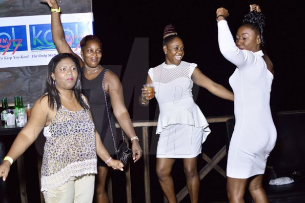Anthiny MinttFreelance PhotographerA group of ladies enjoy themselves at Krazy Kris' birtday party at Jewels' Port Henderson Road, Portmore, on Saturday.