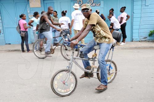 Ricardo Makyn/Staff Photographer.
This Bicycle seems  to be the best mode of Transport in Riversdale on Labour Day in St Catherine on Monday 25.5.2009.