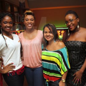 Anthony Minott/Freelance Photographer
From left, Jordanne Jackson of Baileys, , Desaree Roberts, of Beauty Concept Ltd: , Tiffany Wong of Supreme Ventures Ltd: , Shelly-Ann Weeks,  Sex educator and talk show host and Acropolis promotional hostess:Carlene Davis pose for the camera during Ladies Night at the Arena, Acropolis Gaming and Entertainment Centre, Portmore Town Centre, Portmore last Saturday, August 25, 2012.