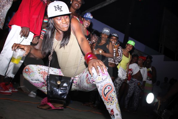 Anthony Minott/Freelance Photographer
She was the life of the party, here she gets the attention of the crowd during Link Up Fridays, Shortwood Road, Grants Pen, in St Andrew on Saturday night, February 3, 2012.