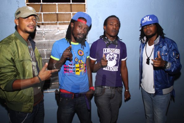 Anthony Minott/Freelance Photographer
From left, artistes Shawn P, Geezy-B, Purpl Skunnk, with Road Manager Duke Royal  during Link Up Fridays, Shortwood Road, Grants Pen, in St Andrew on Saturday night, February 3, 2012.