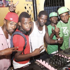 Anthony Minott/Freelance Photographer
Selectors from left, Bling, KC, Harry Hype, DJ Arch, and DJ Marlon, gave the party-hungry patrons what they wanted during Link Up Fridays, Shortwood Road, Grants Pen, in St Andrew on Saturday night, February 3, 2012.