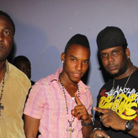 Anthony Minott/Freelance Photographer 
Promoter Cass (2nd right), pose alongside, DJ Khyda and friends  during Link Up Fridayz, 20 Shortwood Road, Grants Pen, St Andrew on Friday, March 2, 2012