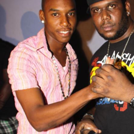 Anthony Minott/Freelance Photographer
DJ Khyda  (left), showing his respect for Promoter Cass, of G5 Entertainment during Link Up Fridayz, 20 Shortwood Road, Grants Pen, St Andrew on Friday, March 2, 2012