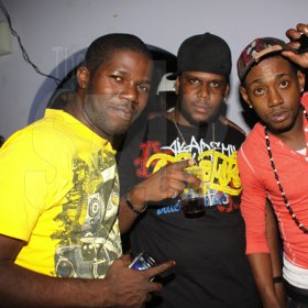Anthony Minott/Freelance Photographer
From left, Disc jock, Harry Hype, promoter Cass and Disc jock Boom Boom acknowledge the camera during Link Up Fridayz, 20 Shortwood Road, Grants Pen, St Andrew on Friday, March 2, 2012