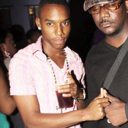 Anthony Minott/Freelance Photographer
DJ Khyda and singer Devonte take a photo opt during Link Up Fridayz, 20 Shortwood Road, Grants Pen, St Andrew on Friday, March 2, 2012