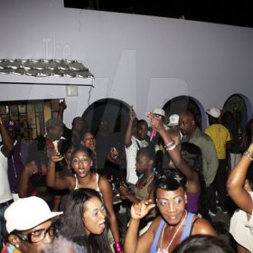 Anthony Minott/Freelance Photographer
 The patrons having a whale of a time during Link Up Fridayz, 20 Shortwood Road, Grants Pen, St Andrew on Friday, March 2, 2012