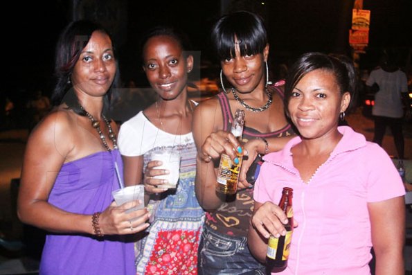 Anthony Minott/Freelance Photographer
HAPPY BIRTHDAY: Birthday girl, Kerry and friends during Karaoke night at Lip Stick Bar, Bayside, Portmore, St Catherine on Sunday, October 9, 2011. The girls came to promote their club's new location in Hellshire which will be opening soon.