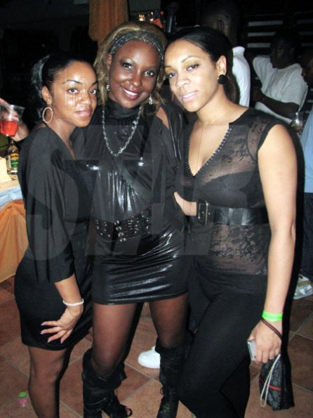 Laranzo Dacres Photo

Singjay Black Queen (centre) is flanked by two fans while attending Macka Diamond's birthday party recently.