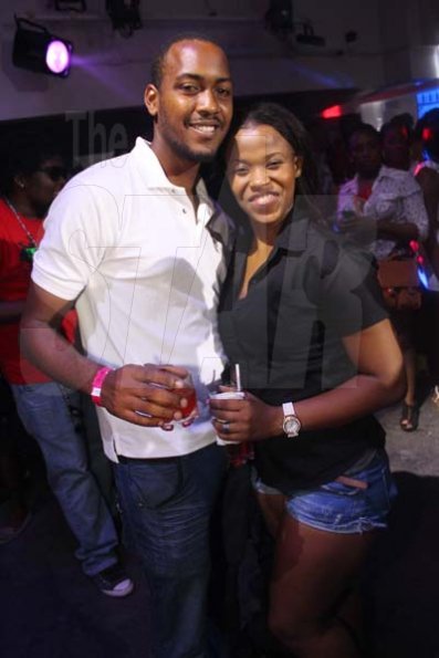 Anthony Minott/Freelance Photographer
Patrons enjoying each other's company during a Magnum All Stars Million Dollar Face-off at Famous Night Club in Portmore last Thursday, December 5, 2013.