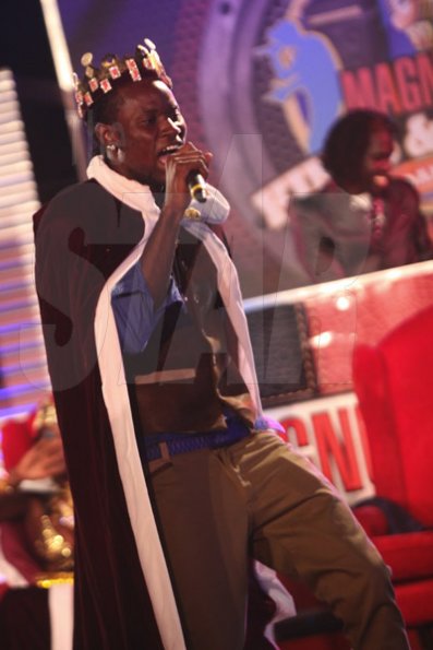 Anthony Minott/Freelance Photographer
The new King, Jonnah performs after his crowning during the Magnum Kings and Queens of Dancehall final live show at D'Entrance, Constant Spring Road, St Andrew on Saturday night.