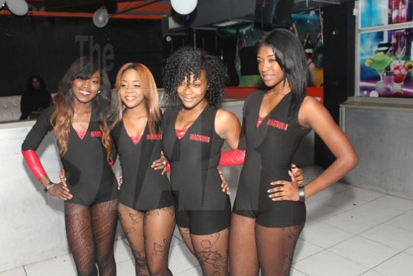 Anthony MInott/Freelance Photographer
Magnum girls share lens tiime during a Magnum Portmore Dancehall Awards function at Club NTyce, Naggo Head, Portmore, St Catherine last Saturday.
