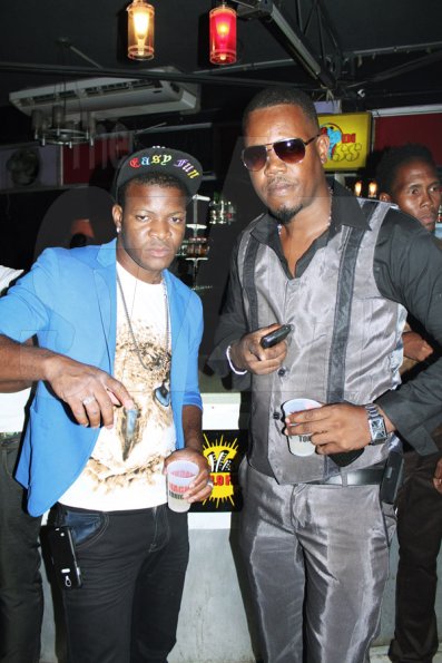 Anthony Minott/Freelance Photographer
Dessi (right), Flava Unit Sound System owner, hang out with Downsound artiste, Specialist during a Magnum Portmore Dancehall Awards function at Club NTyce, Naggo Head, Portmore, St Catherine last Saturday.