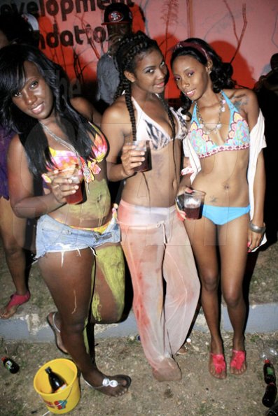 Anthony Minott/Freelance Photographer 
Kim (right), and her Portmore friends strike a pose during Magnum Wet Wet Xtreme party at the Ewarton Sports Complex, in St Catherine last Saturday
