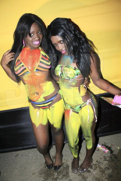 Anthony Minott/Freelance Photographer 
These ladies showed off their bikinis and paint job during Magnum Wet Wet Xtreme party at the Ewarton Sports Complex, in St Catherine last Saturday
