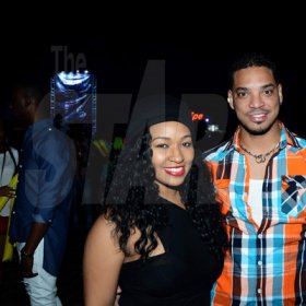 Winston Sill/Freelance Photographer
The Red Stripe sponsored Major Lazer Party and Show, held at Caymanas Estate, St. Catherine on Friday night December 19, 2014.
The beautiful Tara Osborne gets close with her equally handsome beau Jason Jones.