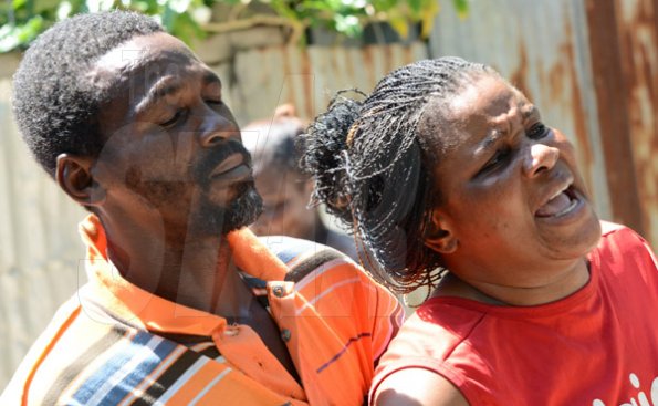 Rudolph Brown/Photographer
Jennifer McDonald, Mother and grandmother mourning the death of family after gunmen shoot up seven killing five including three children and set their home ablaze at Africa settlement in March Pen Community in Spanish Town on Sunday, October 9