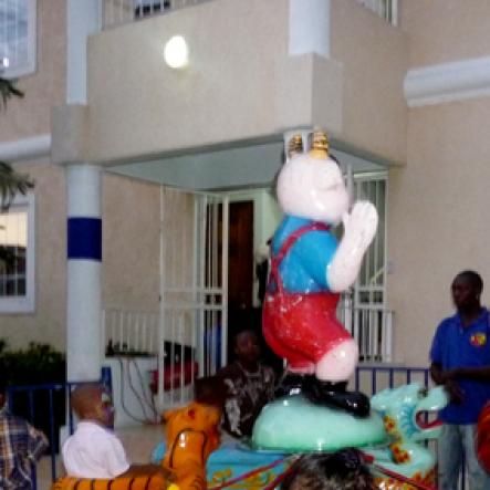 Roxroy McLean Photo

Children having a grand time on the merry-go-round at Marco-Dean's birthday party. The 'media baby', who turns three, is the son of entertainers D'Angel and Beenie Man.
