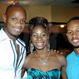 Winston Sill / Freelance Photographer
Sprinters Asafa Powell (left) and Michael Frater, cuddle up for their pic with Melaine.





 Walker (centre); and Michael Frater (right)..Surprise Birthday Party for Melaine Walker, hosted by a group of friends, held at the Jamaica Pegasus Hotel, New Kingston on Friday night January 1, 2010.