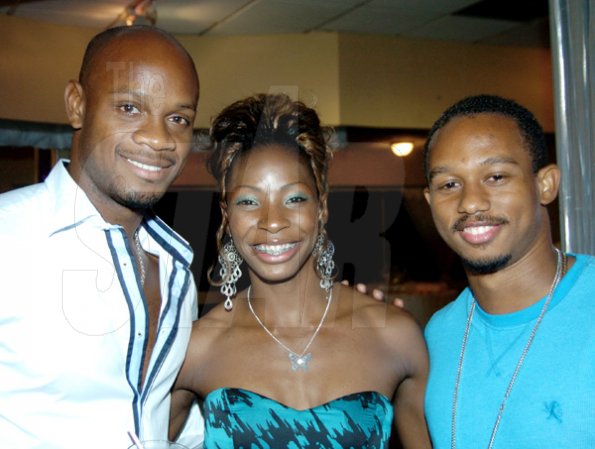Winston Sill / Freelance Photographer
Sprinters Asafa Powell (left) and Michael Frater, cuddle up for their pic with Melaine.





 Walker (centre); and Michael Frater (right)..Surprise Birthday Party for Melaine Walker, hosted by a group of friends, held at the Jamaica Pegasus Hotel, New Kingston on Friday night January 1, 2010.