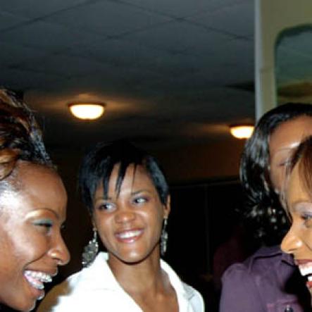 Winston Sill / Freelance Photographer
Brigitte Foster-Hylton (right), adds her congrats to Melaine Walker (left) on another birthday, while  Janelle Gordon looks on.




Surprise Birthday Party for Melaine Walker, hosted by a group of friends, held at the Jamaica Pegasus Hotel, New Kingston on Friday night January 1, 2010. ;  (centre); and .