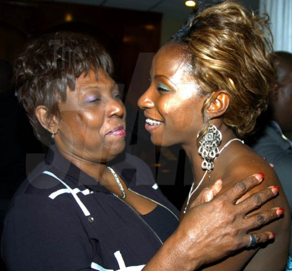 Winston Sill / Freelance Photographer
Minister of Sports Olivia 'Babsy' Grange embraces the birthday belle Melaine Walker.



Surprise Birthday Party for Melaine Walker, hosted by a group of friends, held at the Jamaica Pegasus Hotel, New Kingston on Friday night January 1, 2010.