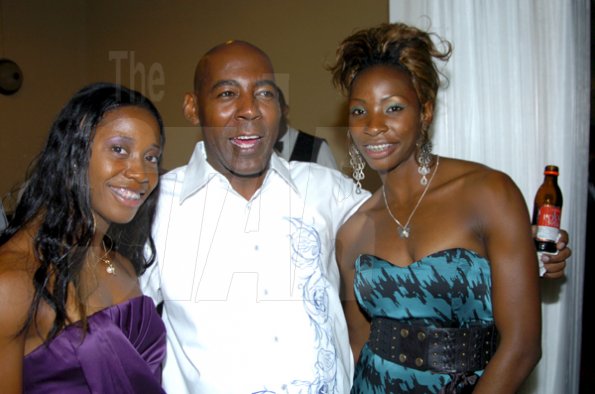 Winston Sill / Freelance Photographer
Garfield Daley, sales representitive, Caribbean Producers Jamaica lymes with Shelly-Ann Fraser (left)  and Melaine Walker.


Surprise Birthday Party for Melaine Walker, hosted by a group of friends, held at the Jamaica Pegasus Hotel, New Kingston on Friday night January 1, 2010.