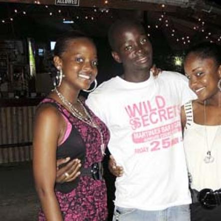 From left: Friends Joannell Smith, Christopher Lake, Shamone Gordon and Melissa Malcolm are determined to have a good time at 'Meltdown' in Montego Bay recently.