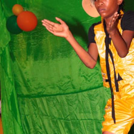 Anthony Minott/Freelance Photographer
Annisa Murray performs to dancehall tunes during a Mini Miss Portmore 2010 grand coronation show at the Portmore HEART Academy on Saturday, May 22, 2010.