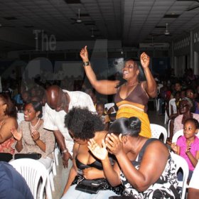 Anthony Minott/Freelance Photographer
The crowd react to the performances during a Mini Miss Portmore 2010 grand coronation show at the Portmore HEART Academy on Saturday, May 22, 2010.