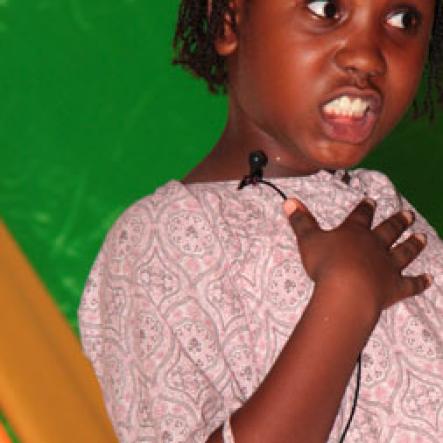 Anthony Minott/Freelance Photographer
Shanoya Edwards did a poem titled: 'Daddy' during a Mini Miss Portmore 2010 grand coronation show at the Portmore HEART Academy on Saturday, May 22, 2010.