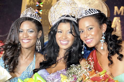 Winston Sill / Freelance Photographer
Miss Jamaica World 2011, Danielle Crosskill, is flanked by Kayla Mendes (left), first runner-up, and Chantel Davis, second runner-up after the three earned their titles on Saturday during the Miss Jamaica World 2011 pageant at The Pegasus Hotel.