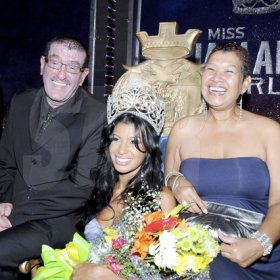 Winston Sill / Freelance Photographer
The new Miss Jamaica 2011  Danielle Crosskill flanked by proud parents her father Simon and mother Patricia. at the grand coronation  on Saturday at Jamaica Pegasus hotel.


Miss Jamaica world.