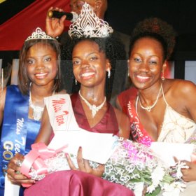 Anthony Minott/Freelance Photographer
Michelle Cole (centre), sashed by Ken's Wildflower , the newly crowned Miss Teen Portmore, is flanked by her first runner-up, Christeen Marshall, (left) Miss NF Barnes Construction, and third place, Anushka Gaynor, Miss Portmore Gas Distributors, during a Burger King/Jamaica Money Market Brokers (JMMB), Miss Teen Portmore pageant at the Portmore HEART Academy on Sunday.