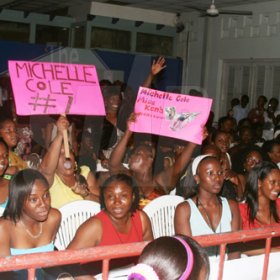 Anthony Minott/Freelance Photographer
Placards hoist in support of Michelle Cole during a Burger King/Jamaica Money Market Brokers (JMMB), Miss Teen Portmore pageant at the Portmore HEART Academy on Sunday.