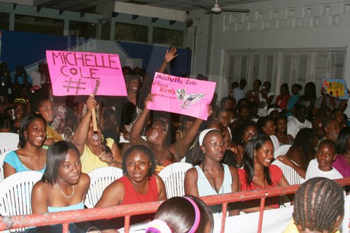 Anthony Minott/Freelance Photographer
Placards hoist in support of Michelle Cole during a Burger King/Jamaica Money Market Brokers (JMMB), Miss Teen Portmore pageant at the Portmore HEART Academy on Sunday.