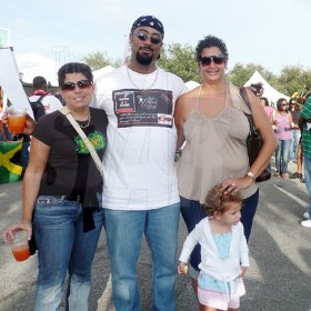 Keisha Shakespeare/Staff Reporter
Chef Paul Taffe (second left) went up for the Grace Jamaican Jerk Festival USA and he is taking a load of with his friends, Guylaine Dennery (left), Tricia Rudd (right) and her daughter, Taylor-Jane Rudd.