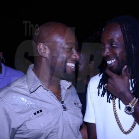 Winston Sill/Freelance Photographer
MAD Circle Entertainment in association with Smirnoff presented OSMOSIS Party, held at Caymanas Estate, on Christmas Eve night  December 24, 2013. Here are Garth Walker (left); and Mavado (right).