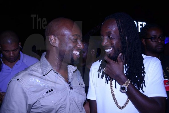 Winston Sill/Freelance Photographer
MAD Circle Entertainment in association with Smirnoff presented OSMOSIS Party, held at Caymanas Estate, on Christmas Eve night  December 24, 2013. Here are Garth Walker (left); and Mavado (right).