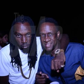 Winston Sill/Freelance Photographer
MAD Circle Entertainment in association with Smirnoff presented OSMOSIS Party, held at Caymanas Estate, on Christmas Eve night  December 24, 2013. Here are Mavado (left); and MAD Circle director Phillip Palmer (right).