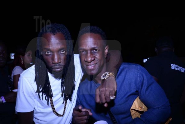 Winston Sill/Freelance Photographer
MAD Circle Entertainment in association with Smirnoff presented OSMOSIS Party, held at Caymanas Estate, on Christmas Eve night  December 24, 2013. Here are Mavado (left); and MAD Circle director Phillip Palmer (right).