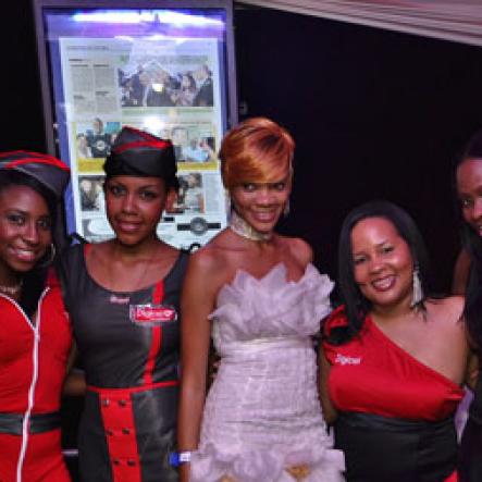 Contributed
Osmosis - Digicel's head of sponsorship Shelly Curran (centre) is flanked by the Digicel Fashion Police team at Osmosis the All-Star edition.