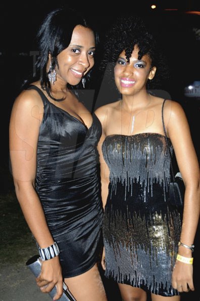 Winston Sill / Freelance Photographer
Nickiesha Blake (left) and Stacy-Ann Thomas partying like  rock stars at Osmosis held at Fort Charles. 

*********************************************************

Osmosis Party, held at Fort Charles, Port Royal on Saturday night July 2, 2011.