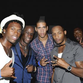 Winston Sill / Freelance Photographer

Osmosis' Philip "PP" Palmer (second left) and pals Scott Dunn (right) kicking it with English footballers Daniel Sturridge from Chelsea F.A.(left), Chris Smalling (centre ) from Manchester United and  local artistes, Craig "Leftside" Parks (second right) and Leon Stuuridge at Osmosis, Fort Charles, Port Royal on Saturday, July 2.  
********************************************************
Osmosis Party, held at Fort Charles, Port Royal on Saturday night July 2, 2011.