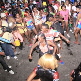Anthony Minott/Freelance Photographer 
Patrons enjoying themselves during Pon Di Spot Fridayz held at Headley Avenue, Drewsland last Friday. The event is held every two weeks.