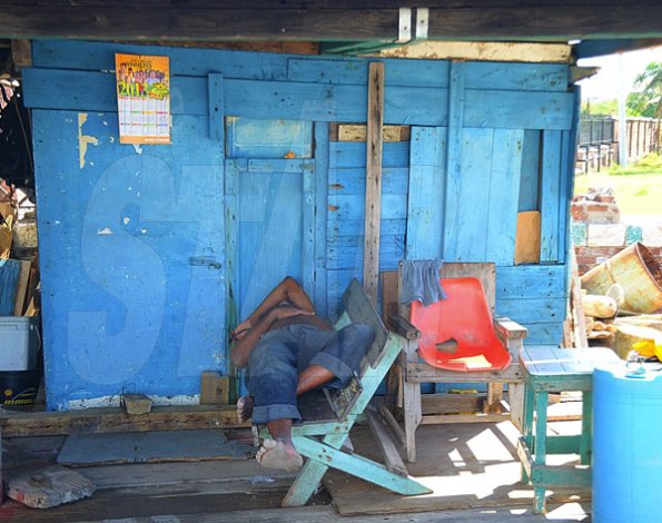 Ian Allen/Photographer
Sleeping Fishermen in Port Royal.