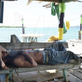 Ian Allen/Photographer
Sleeping Fishermen in Port Royal.